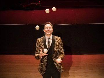 Cincinnati Queen City Stunt Circus professional entertainment performer juggling balls juggler brian