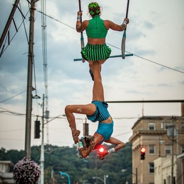 Cincinnati Queen City Stunt Circus professional entertainment performer duo trapeze dragon fire show