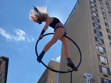 Cincinnati Queen City Stunt Circus professional entertainment performer one woman show acrobat 