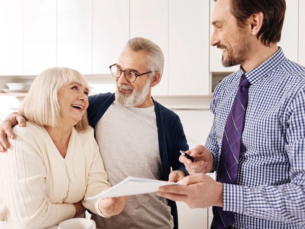 Senior couple with financial advisor