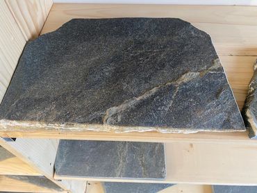 Local Island Slate with Quartz veins, delivering an extremely unique piece of Culinary art with a pu