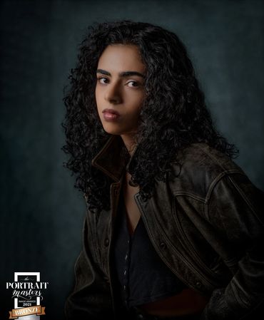 Portrait of a young girl in a studio