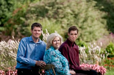 Burlington family portrait of a mother and two sons in an outdoor setting