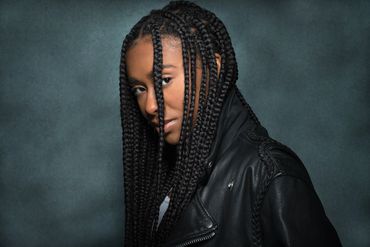 branding headshot of a black woman in a studio