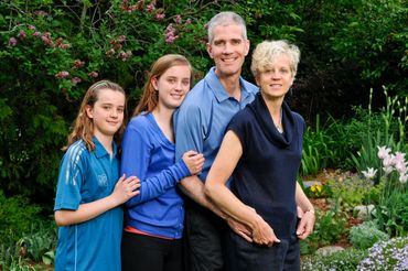 Toronto family portrait of four people in a park setting