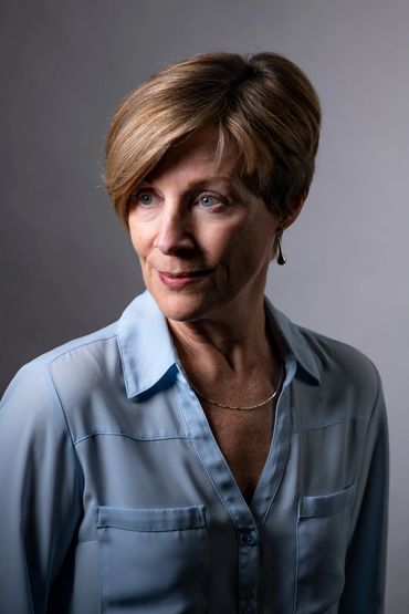 realtor headshot of a woman in a studio