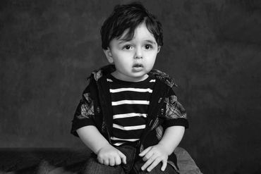 Portrait of a three year old boy in awe of the process