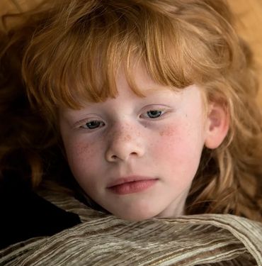 Close up portrait of a young five year old girl