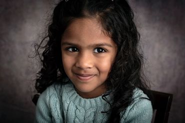 Studio portrait of a four year  old girl.