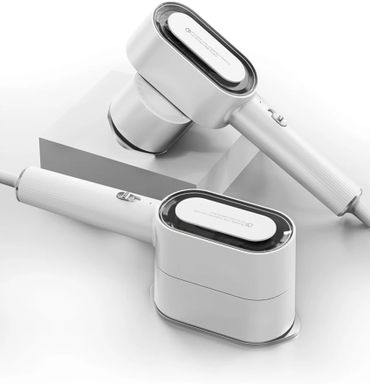 Two sleek, modern white handheld devices with minimalist design on a white surface.