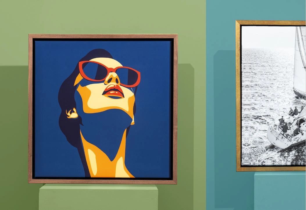 Pop art portrait of a woman with red sunglasses on blue background.