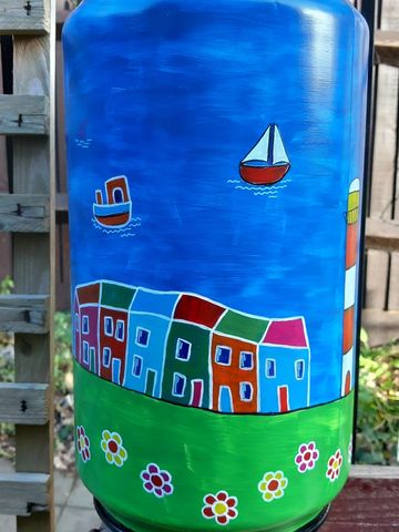 Coffee shop, coffee bean tin, decorated all round with seaside town scene