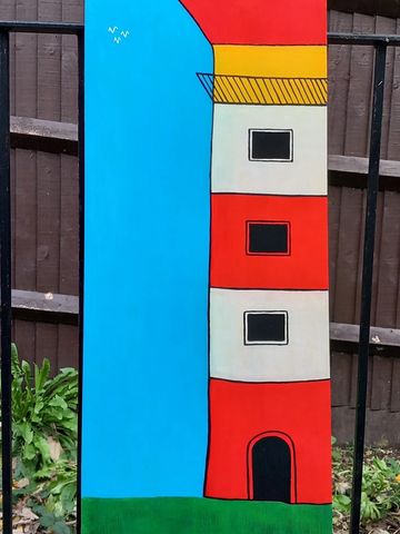 Large wooden shelf with a red and white striped lighthouse