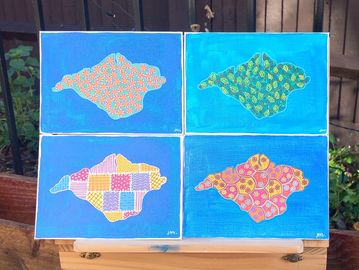 4 x small canvases with Island silhouette individually decorated 