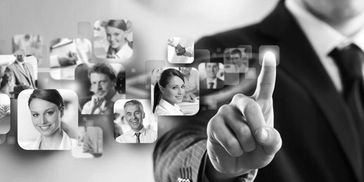 Person selecting digital profile icons in black and white.