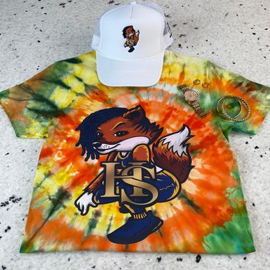 Elevate your style with our vibrant green, yellow, and orange tye-dye swirl tee, showcasing the Heri