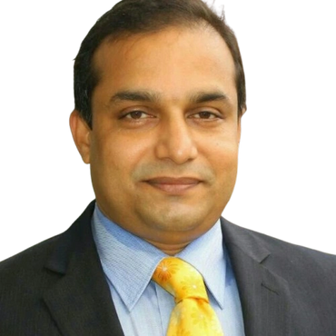 Professional man wearing a suit and yellow tie.