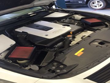 Clean engine bay with a visible air filter and Hyundai engine cover.