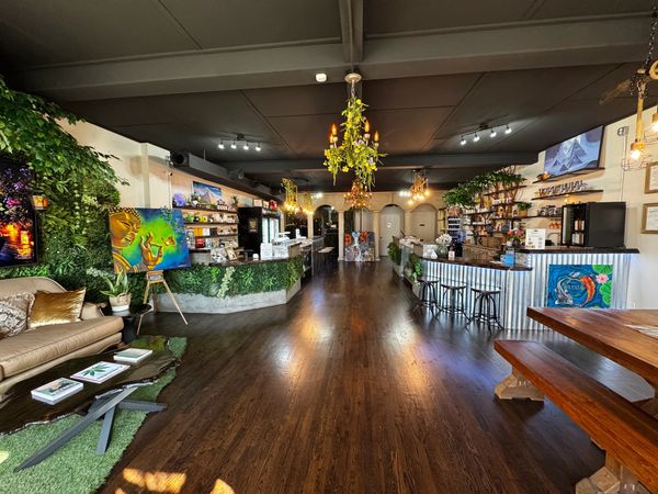 The inside of Evexia, view from the front door—coffee bar to the right, Bud bar to the left.  