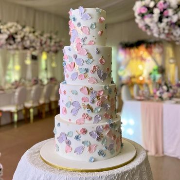 Pastel shades of Petals Wedding Cake By Daniel's Bakery Cafe