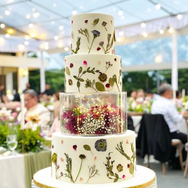 Leaves themed Wedding Cake By Daniel's Bakery Cafe
