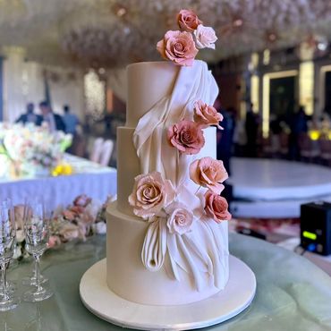 Pink shades of Rose Wedding Cake By Daniel's Bakery Cafe 