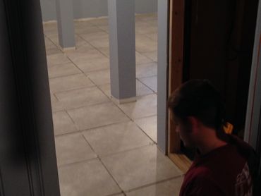 Basement remodeling with new tile floor.