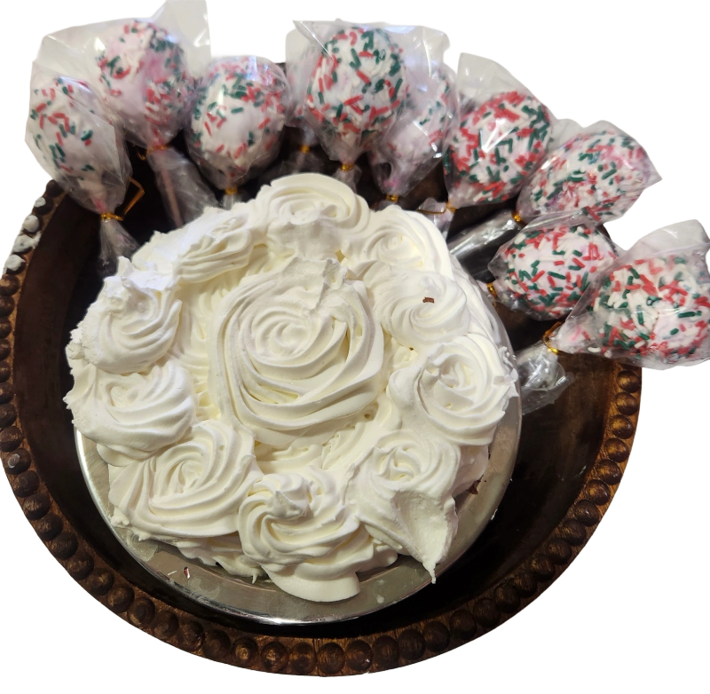 white cake with cake pops.png