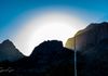 Sun rays coming through the mountains at sunset in Big Bend National Park 