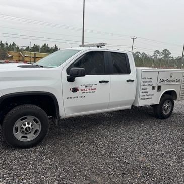 a white chevrolet silverado truck