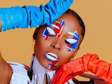 High fashion makeup on female model for a high concept and creative photoshoot 