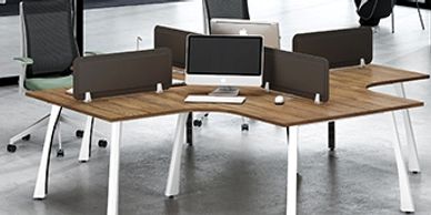 office workstations in Noida with L shape table top angular white legs and black color screens