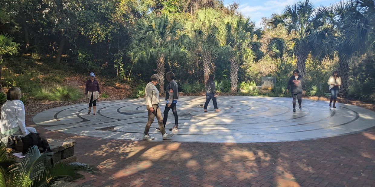 people walking on labyrinth