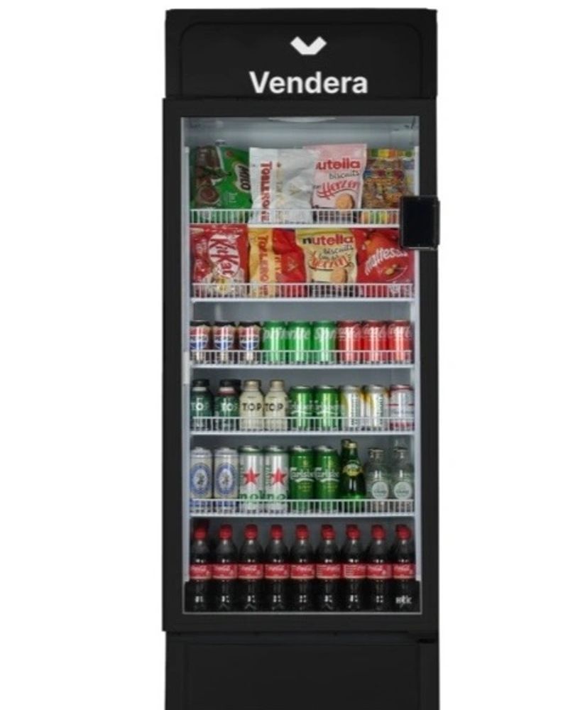 People buying from a vending machine

