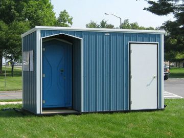 Custom Steel Sheds.  this shed created with a porta potty option for a job site.