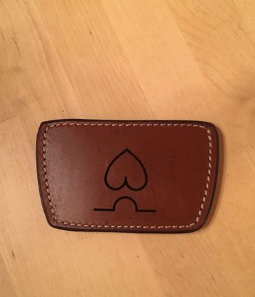 engraved brand on leather gun holster
