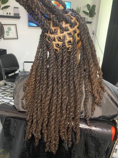 Long twisted dreadlocks hairstyle.