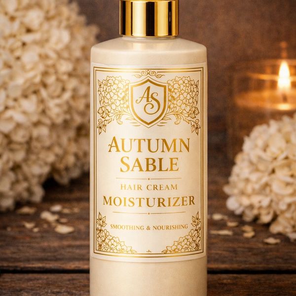 Elegant Autumn Sable hair cream moisturizer bottle with gold accents.