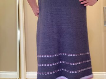 Knit skirt with partial stripes around bottom 