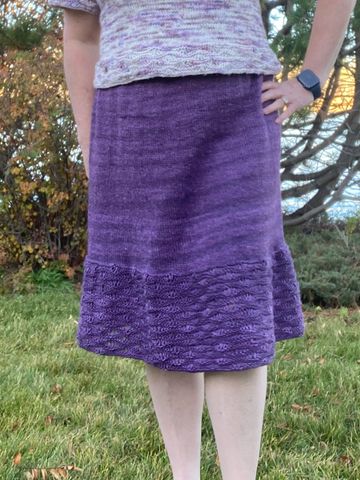 hand knit skirt with a wavy Seagram stitch design at the hemline.
