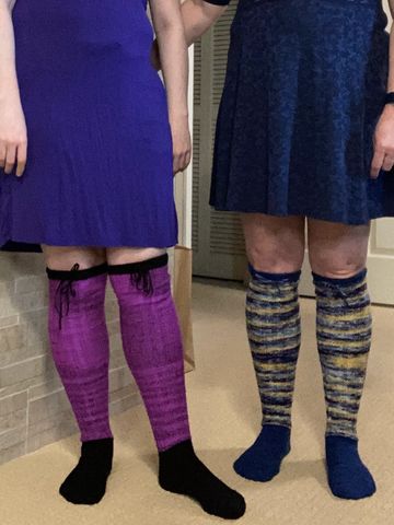 Two people wearing over the knee socks