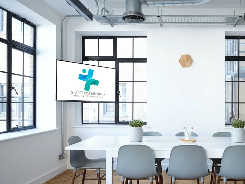 Smart TV in the corner of a conference room_St.png