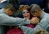 Relatives of U.S. Navy sailor killed in the USS Cole attack hug and cry at memorial service in Norfolk - 2000