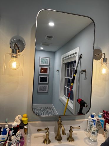 Bathroom mirror installation