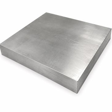 A smooth, square metal block with a brushed finish.