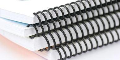 Printed training manuals, custom coil binding, presentation printing, bindery