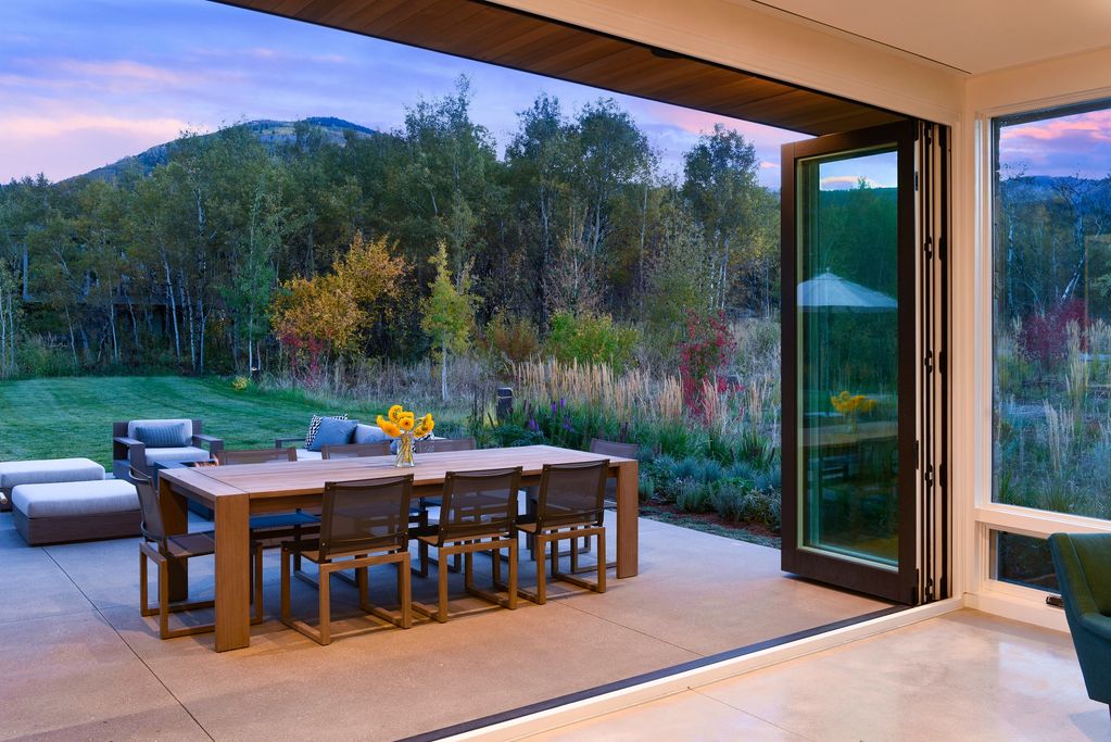 Rear of home showing indoor outdoor living area.