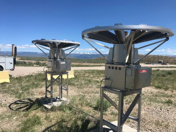 Two thermoelectric generators installed in a Wyoming desert plain.