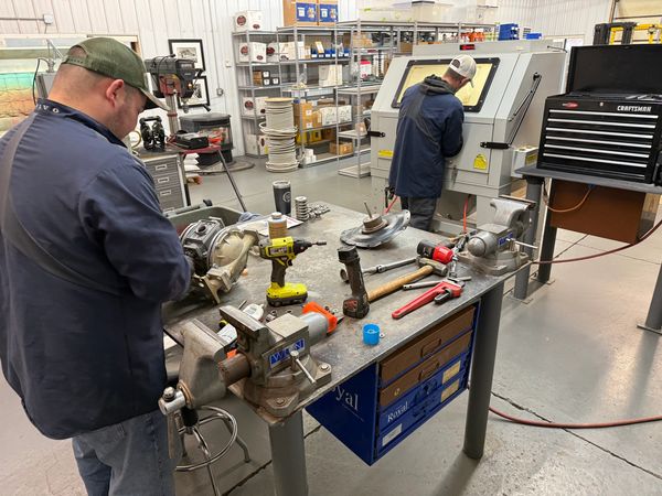 Wyoming Service and Supply Technicians  sandblasting, and conducting pump overhaul.