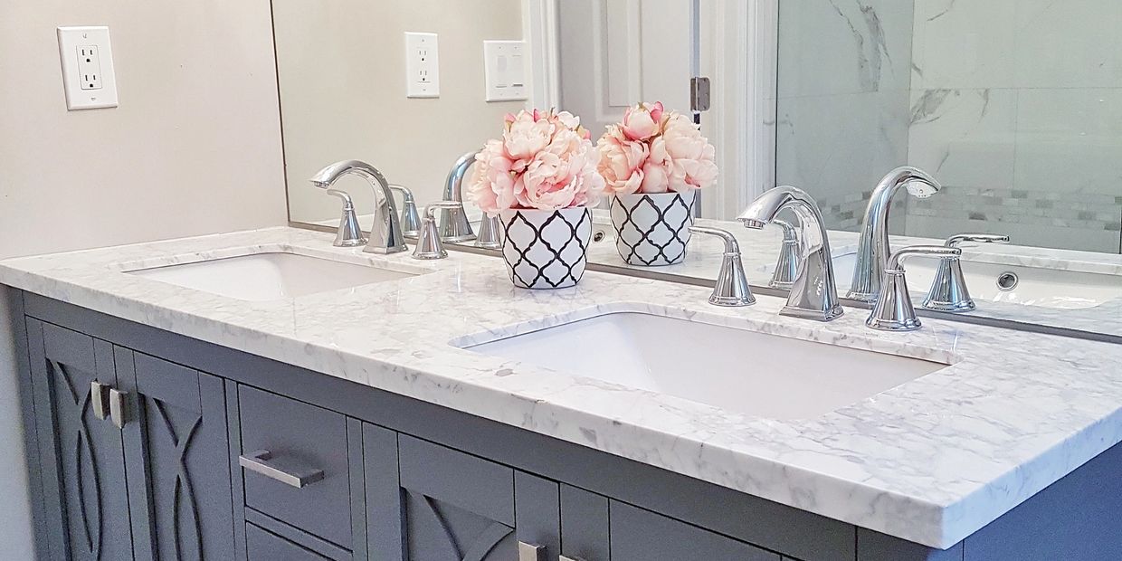 grey vanity from Home Depot with marble quartz installed during bathroom renovation 